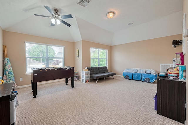 1839 Pembrook Cir, Conroe, TX 77301 - rec room featuring light colored carpet, baseboards, visible vents, a ceiling fan, and lofted ceiling