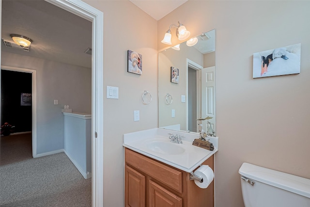 1839 Pembrook Cir, Conroe, TX 77301 - half bath with baseboards, toilet, and vanity