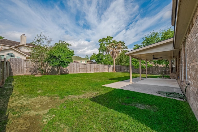 1839 Pembrook Cir, Conroe, TX 77301 - view of yard with a patio, ceiling fan, and a fenced backyard