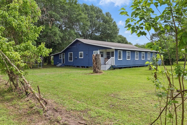 exterior space featuring a front yard