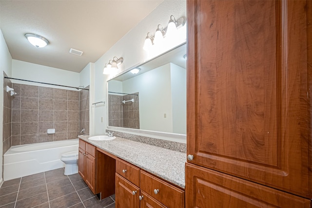 full bath with tile patterned floors, toilet, shower / washtub combination, vanity, and visible vents