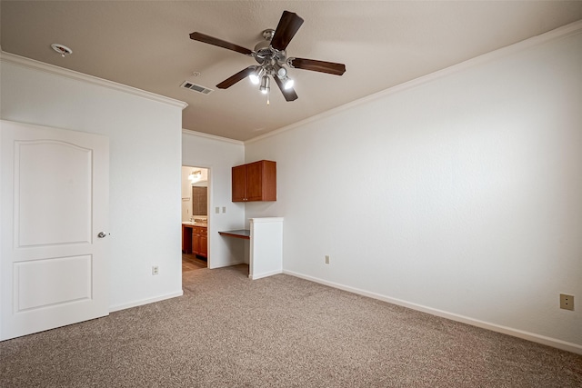 unfurnished bedroom with ornamental molding, visible vents, light colored carpet, and baseboards