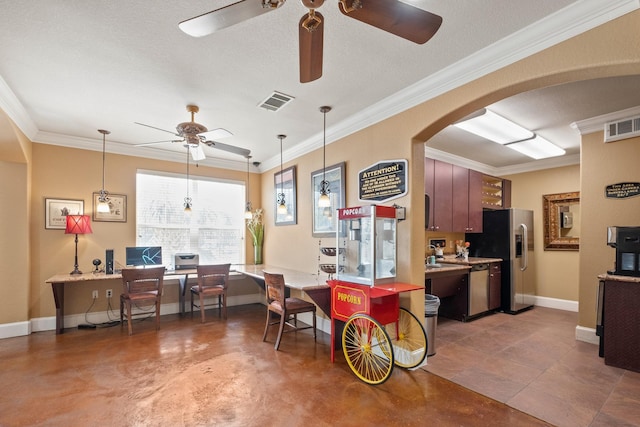kitchen featuring appliances with stainless steel finishes, ceiling fan, baseboards, arched walkways, and ornamental molding