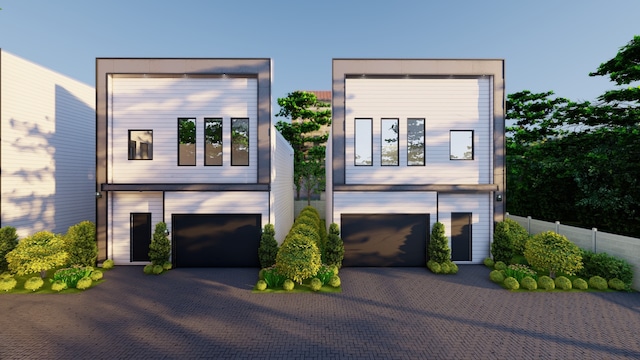 7127 England St, Houston, TX 77021 - contemporary home featuring a garage, fence, and driveway