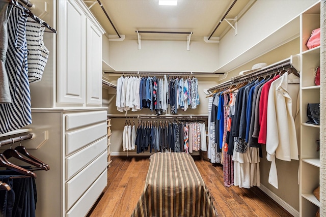 36927 Anglers Way, Pinehurst, TX 77362 - walk in closet featuring hardwood / wood-style floors