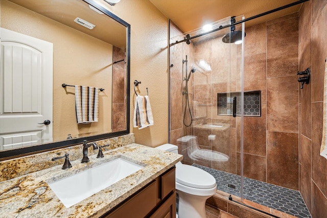 36927 Anglers Way, Pinehurst, TX 77362 - full bathroom with toilet, a shower stall, and vanity