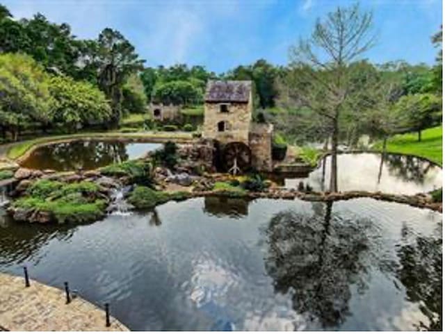 36927 Anglers Way, Pinehurst, TX 77362 - view of home's community with a water view
