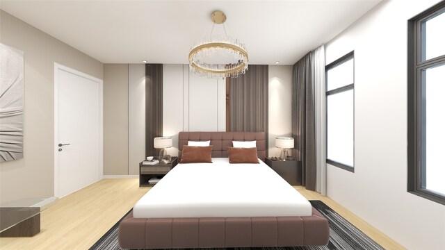 7125 England St, Houston, TX 77021 - bedroom with a notable chandelier and light wood-style floors