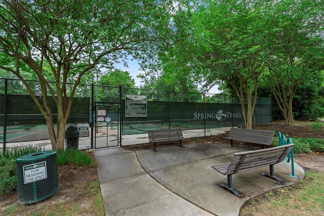 1619 Julia Park Dr, Spring, TX 77386 - view of community featuring a gate and a tennis court