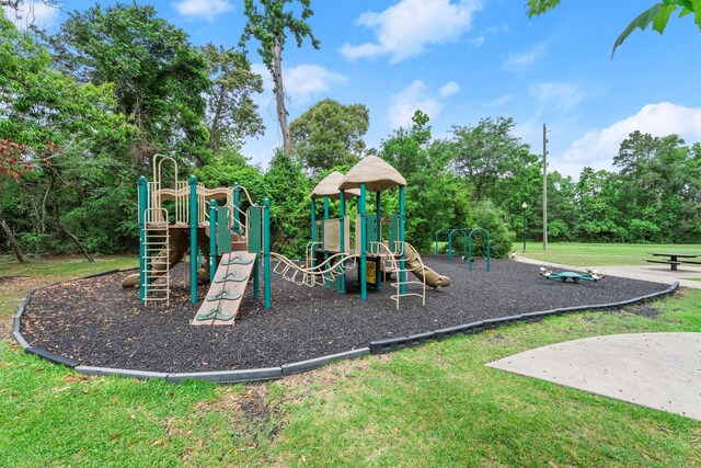 community playground with a lawn