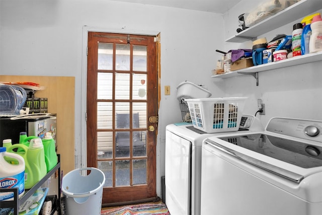 laundry area featuring independent washer and dryer and laundry area