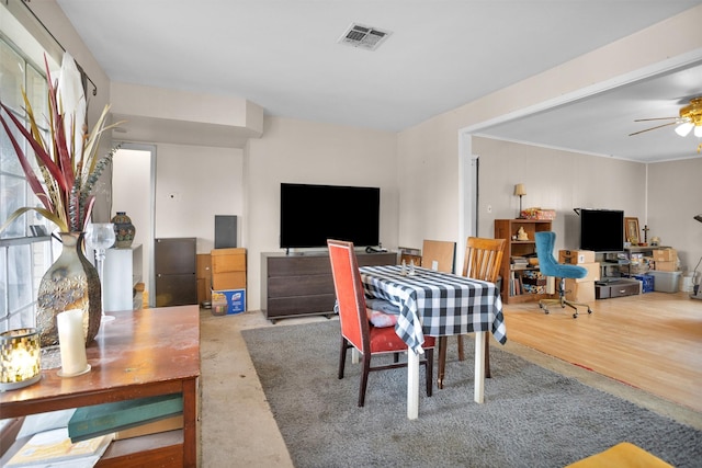 dining room with visible vents and ceiling fan