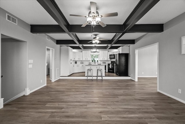 unfurnished living room with beam ceiling, ceiling fan, visible vents, baseboards, and dark wood finished floors