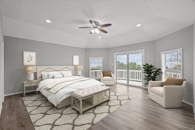 bedroom featuring wood finished floors, recessed lighting, access to outside, and baseboards