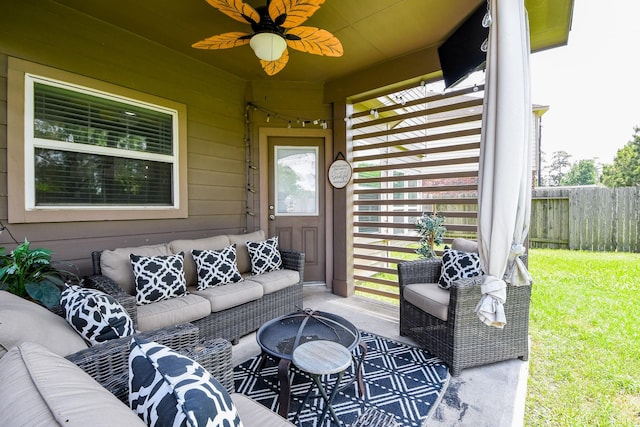 view of patio with fence, ceiling fan, and outdoor lounge area