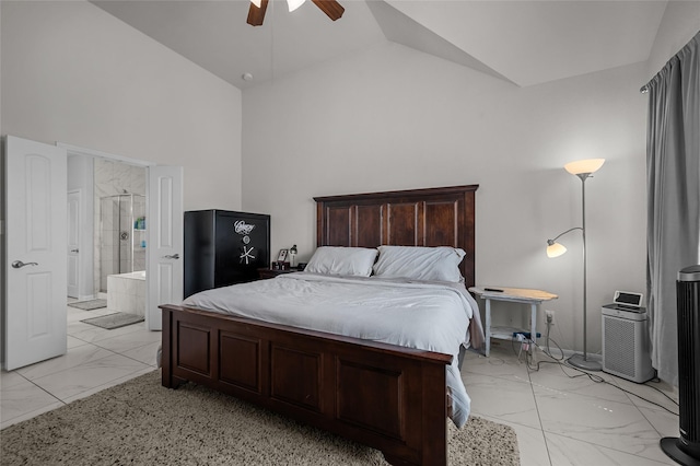 bedroom with connected bathroom, high vaulted ceiling, and marble finish floor