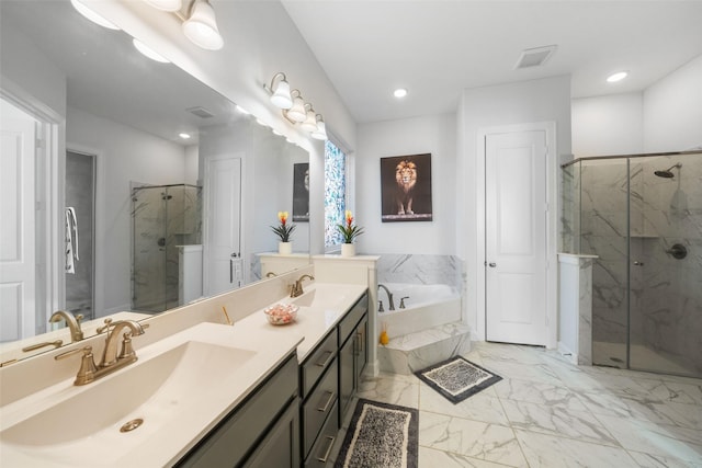 bathroom featuring a marble finish shower, marble finish floor, and a sink