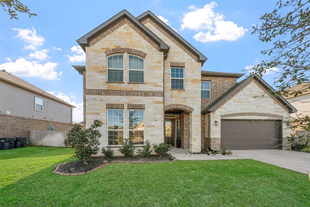 french country home featuring a front lawn, a garage, driveway, stone siding, and fence