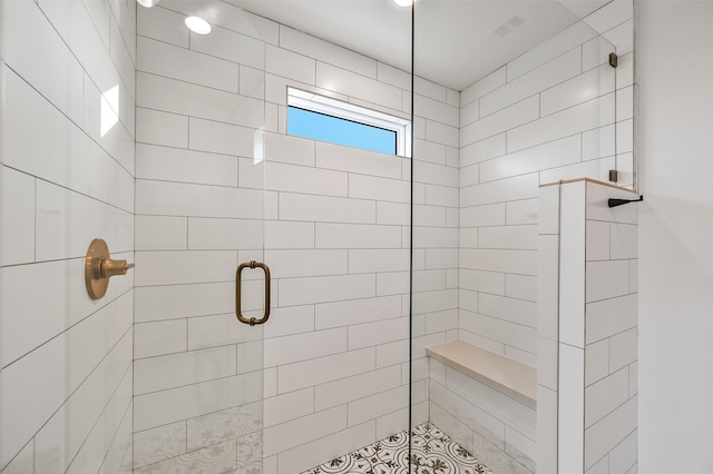 full bathroom with a shower stall