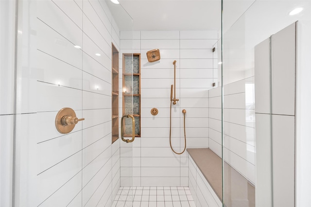 full bathroom with tiled shower