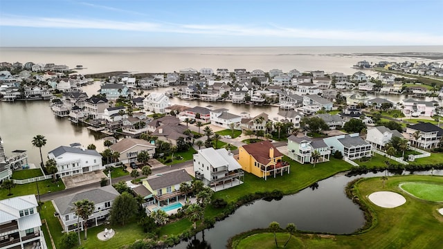 birds eye view of property with a residential view and a water view