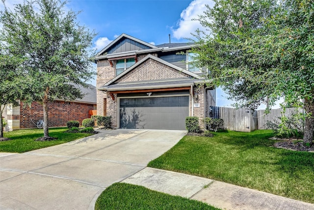 view of front of home with concrete driveway, fence, a front yard, and brick siding
