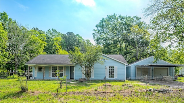 20983 Westgrove Ln, Porter, TX 77365 - view of front of home with covered porch, an outdoor structure, and a garage