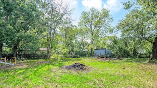 20983 Westgrove Ln, Porter, TX 77365 - view of yard with an outbuilding and a storage unit