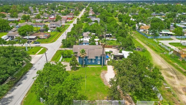 aerial view of property's location with nearby suburban area