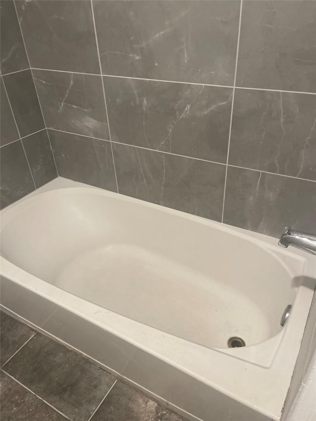 bathroom with tile patterned flooring
