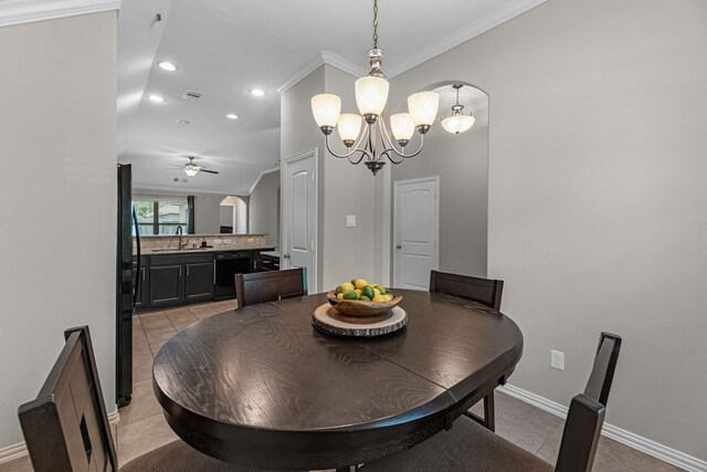 2602 Yellow Pear Way, Fresno, TX 77545 - dining area with light tile patterned floors, ceiling fan, crown molding, recessed lighting, and arched walkways