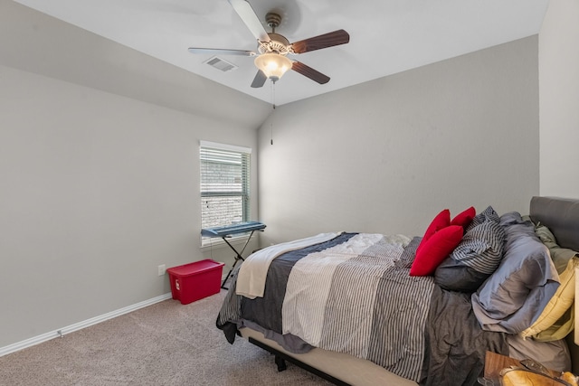 carpeted bedroom with baseboards, visible vents, ceiling fan, and lofted ceiling