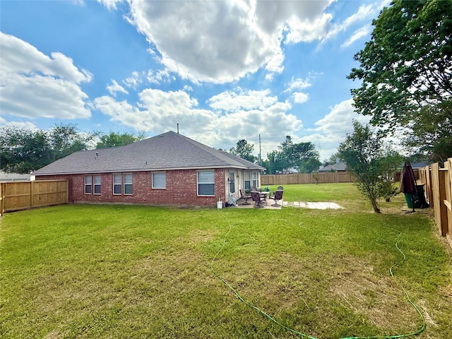 16038 Belleshire Ln, Houston, TX 77084 - rear view of property with a patio area and brick siding
