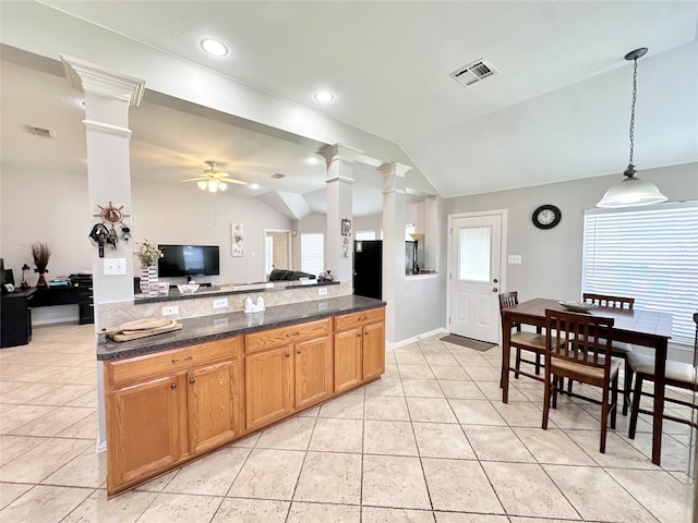16038 Belleshire Ln, Houston, TX 77084 - kitchen with ornate columns, lofted ceiling, a ceiling fan, open floor plan, and light tile patterned floors