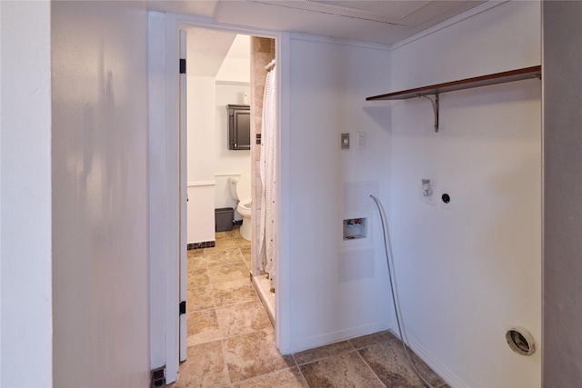 2574 Marilee Ln Unit 1, Houston, TX 77057 - clothes washing area with laundry area, hookup for a washing machine, baseboards, and electric dryer hookup