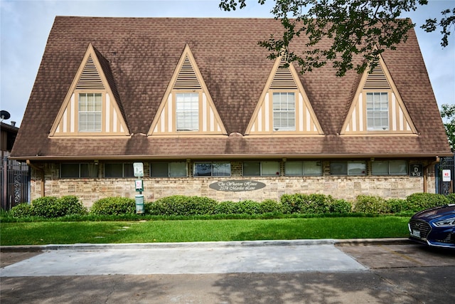 2574 Marilee Ln Unit 1, Houston, TX 77057 - view of front of home with a shingled roof and stone siding
