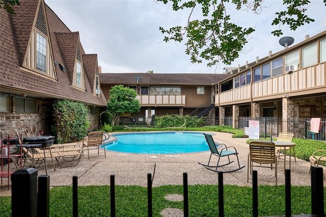 2574 Marilee Ln Unit 1, Houston, TX 77057 - community pool with a patio