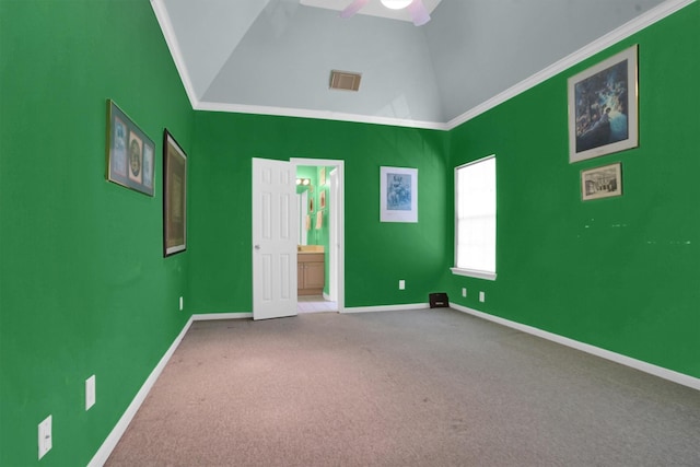 unfurnished bedroom with visible vents, crown molding, baseboards, connected bathroom, and carpet flooring