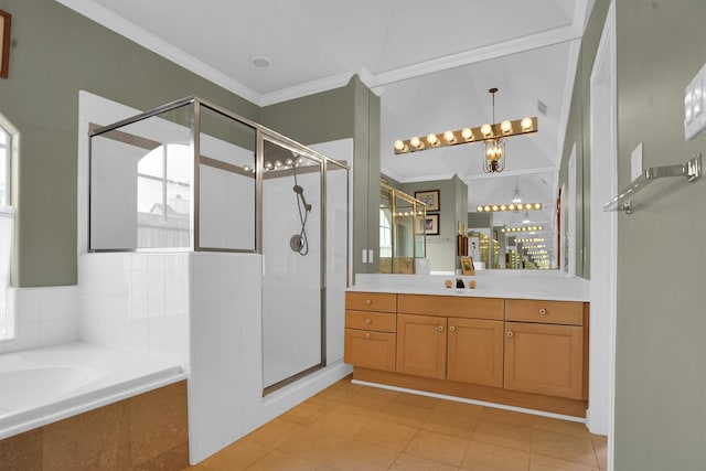 bathroom with a bath, tile patterned flooring, a stall shower, vanity, and ornamental molding