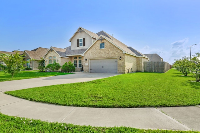 view of front of house with fence, a front lawn, concrete driveway, and brick siding
