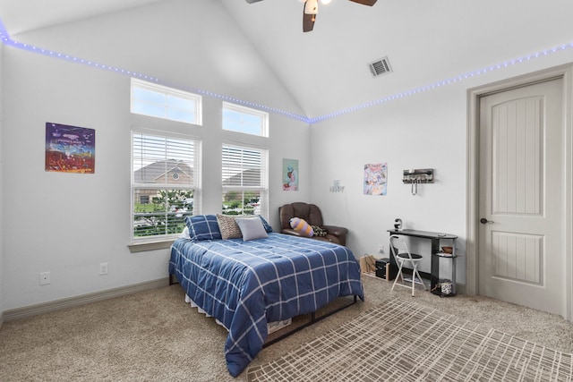 carpeted bedroom featuring baseboards, visible vents, ceiling fan, and high vaulted ceiling