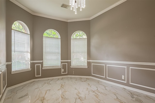 11911 Timpnogos Dr, Tomball, TX 77377 - spare room with visible vents, ornamental molding, a wainscoted wall, and marble finish floor