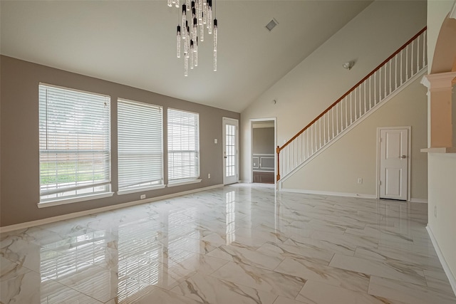 11911 Timpnogos Dr, Tomball, TX 77377 - unfurnished living room featuring baseboards, high vaulted ceiling, marble finish floor, and stairs