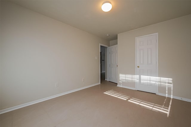 11911 Timpnogos Dr, Tomball, TX 77377 - unfurnished bedroom with baseboards