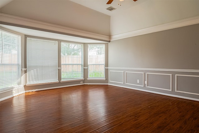 11911 Timpnogos Dr, Tomball, TX 77377 - empty room with visible vents, ceiling fan, dark wood-style flooring, high vaulted ceiling, and wainscoting