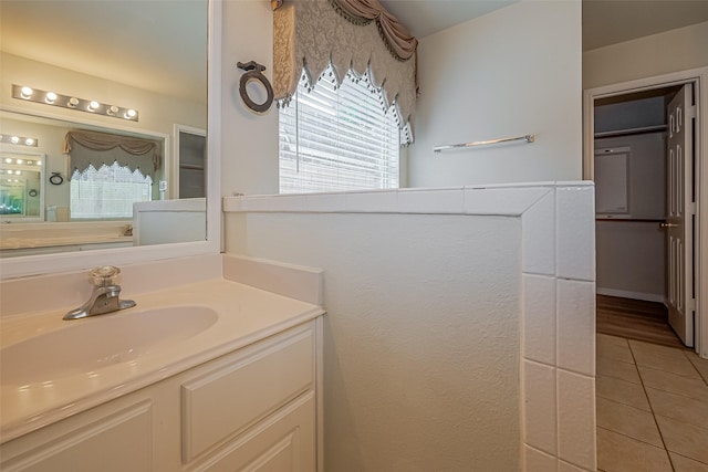 11911 Timpnogos Dr, Tomball, TX 77377 - bathroom featuring vanity and tile patterned flooring
