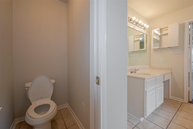 11911 Timpnogos Dr, Tomball, TX 77377 - bathroom with toilet, tile patterned flooring, vanity, and baseboards