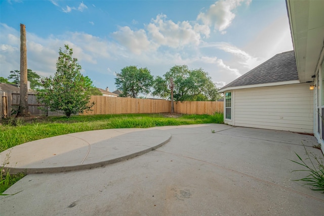 11911 Timpnogos Dr, Tomball, TX 77377 - view of patio with a fenced backyard
