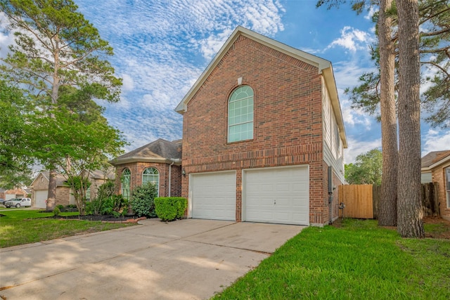 11911 Timpnogos Dr, Tomball, TX 77377 - traditional-style house with brick siding, fence, a garage, driveway, and a front yard