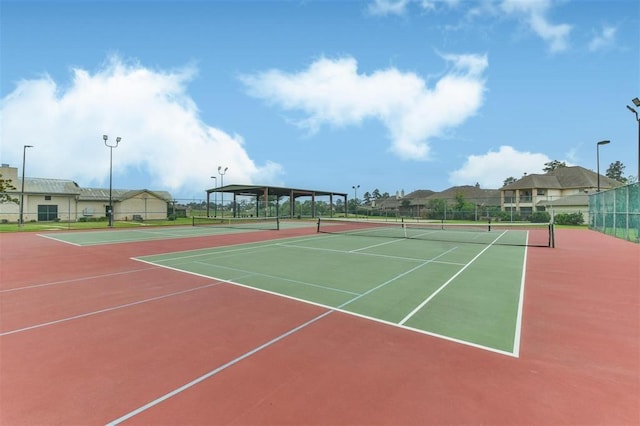 11911 Timpnogos Dr, Tomball, TX 77377 - view of tennis court featuring fence